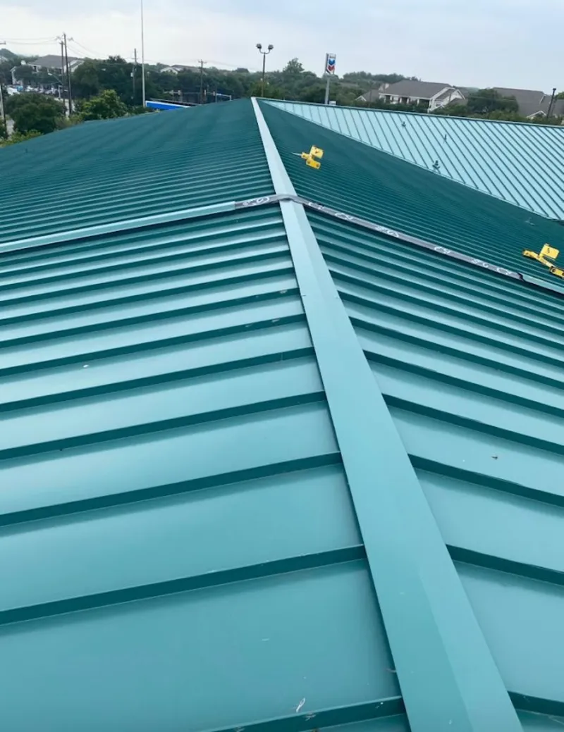 Green commercial metal roof ridge and valley for Metal Roof Repair in Cleveland